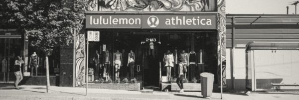Black and while photo of a lululemon shop front