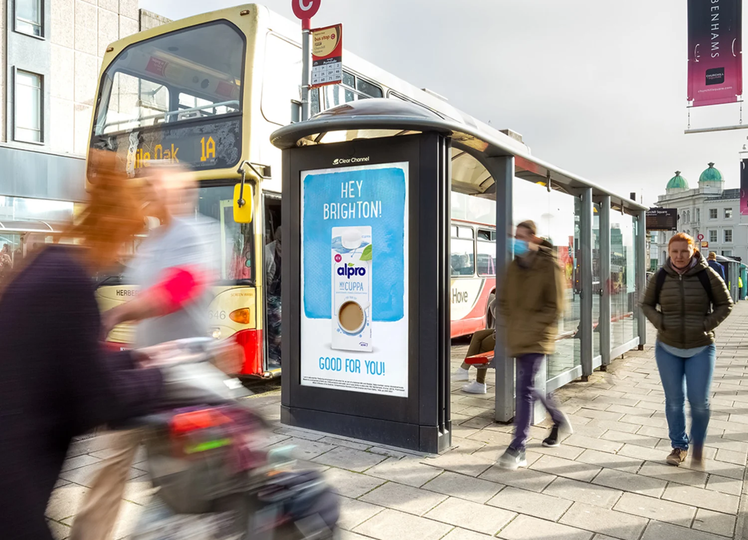 Photo of an Alpro poster, with the line "Hey Brighton" at the top
